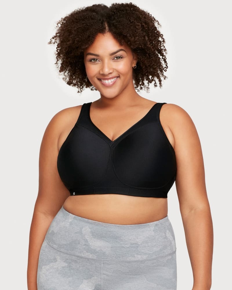 Front of a model wearing a size 38D MagicLift Seamless Sports Bra in Black by Glamorise Sport. | dia_product_style_image_id:263104